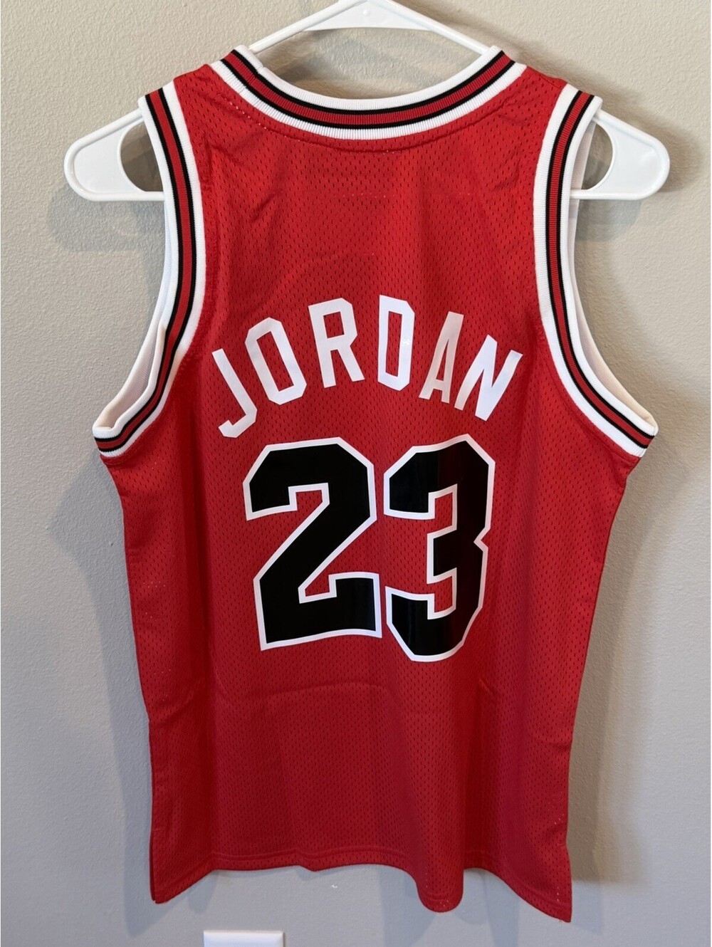 Michael Jordan Youth Large Basketball Jersey Chicago Bulls. Mitchell & Ness